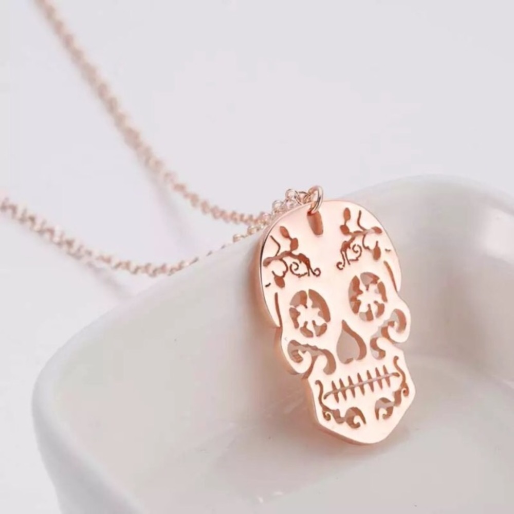 Rose gold skull necklace